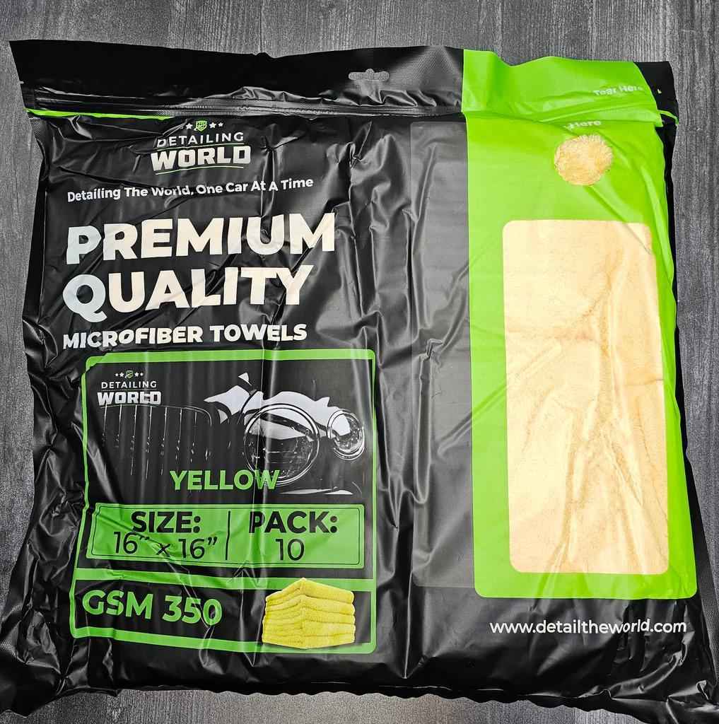 Pack of Premium Quality Microfiber Towels with visible branding on a gray background