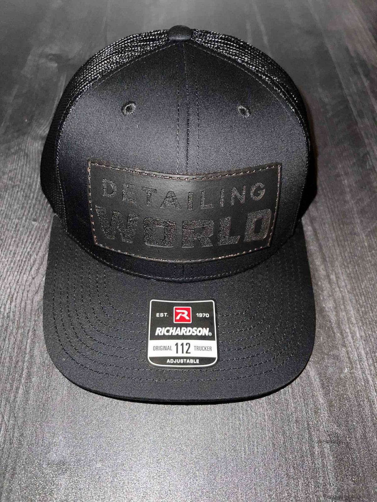 black Detailing World trucker hat
